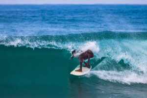 Australian Surfer Riding the Waves at Okanda Surf, Sri Lanka