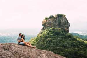 couple love rock admires beautiful views boy girl rock couple love travels couple sri lanka honeymoon asia man woman sigiriya couple mountains 1 1