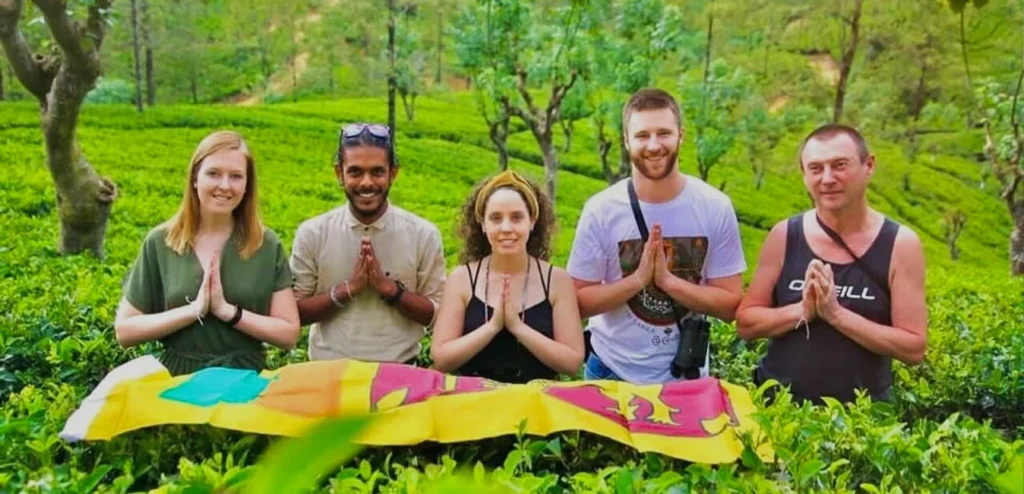 welcoming guests to the vibrant tea plantation sites.