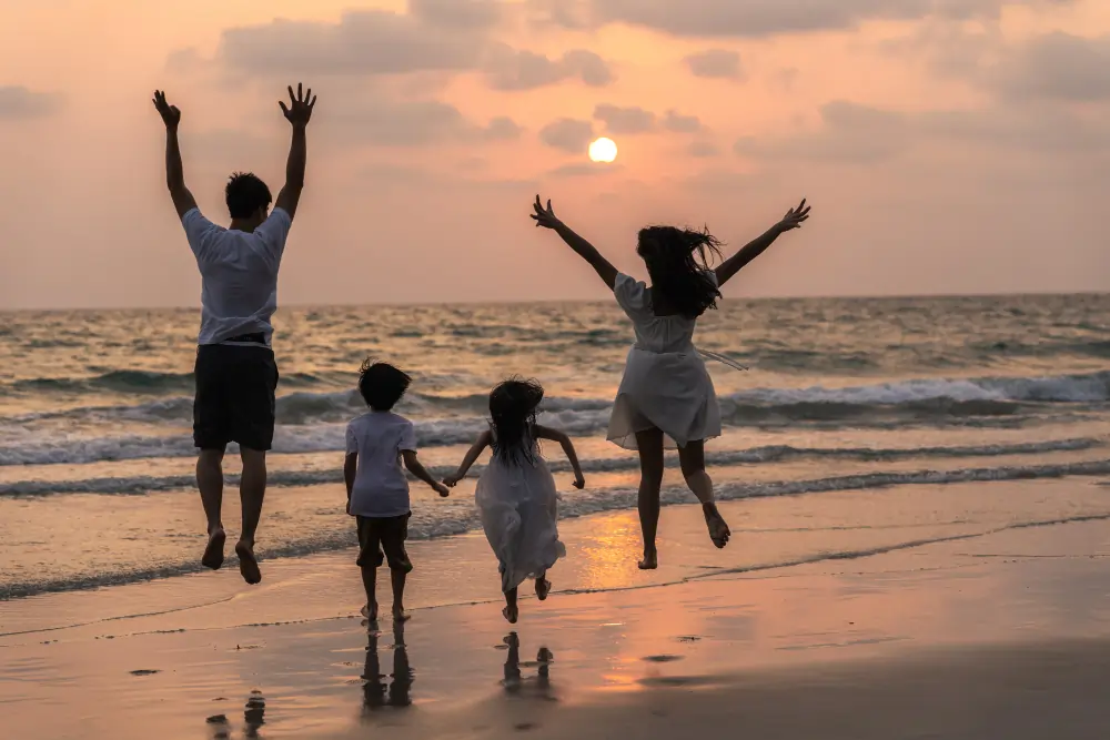 asian-young-happy-family-enjoy-vacation-beach-evening-dad-mom-kid-relax-running-together-near-sea-while-silhouette-sunset-lifestyle-travel-holiday-vacation-summer-concept