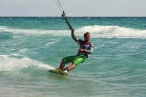 Kitesurfer mastering the waves in Kalpitiya, a popular destination for Kalpitiya kitesurfing in Sri Lanka